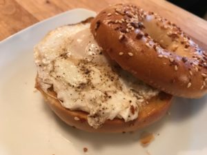 Fried Egg and Cream Cheese on an Epic Everything Bagel.
